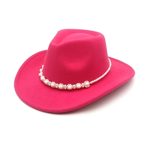 Fuchsia felt western cowboy hat with wide brim and elegant white pearl flower headband