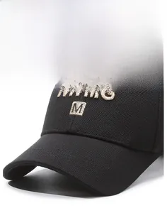 Close-up of golden V.V.I.G 3D embroidery on a black textured twill baseball cap