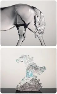Detail of a blue translucent resin horse sculpture with realistic water wave base
