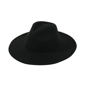 Top-down view of a classic black wide-brimmed wool fedora hat with a pinched crown design