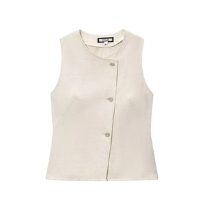 Close-up of linen-blend double-breasted vest with natural woven texture and buttons