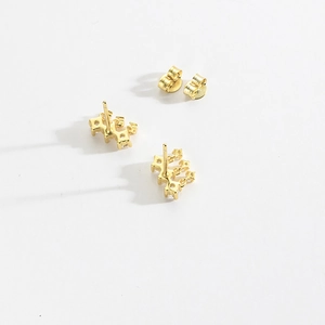 Elegant pair of gold S925 sterling silver stud earrings with sparkling clear cubic zirconia