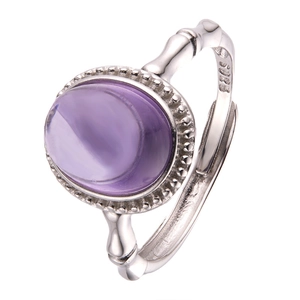Close-up of S925 sterling silver ring with purple amethyst and bamboo joint design