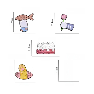 Set of five cute cat paw enamel pins featuring fish, flowers and motivational quotes