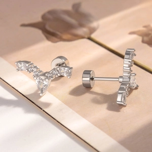 Elegant teardrop zircon V-shape titanium steel stud earrings with screw back on floral paper