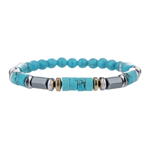 Handmade beaded bracelet for men with turquoise stones and metallic spacers on white background