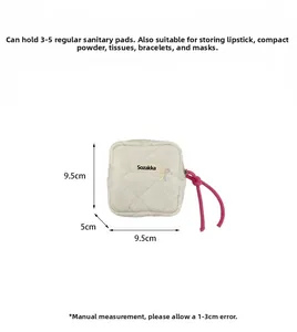 Quilted fabric pouch with 9.5x9.5cm dimensions for makeup and feminine care items