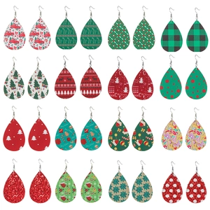 Macro display of 16 pairs teardrop faux leather Christmas earrings set in grid layout