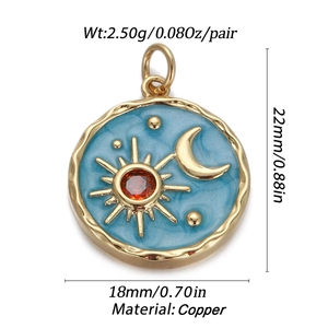 Macro view of blue enamel sun and moon copper pendant with dimension markers