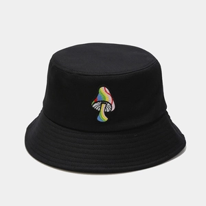 Close-up of a black cotton bucket hat featuring detailed colorful mushroom embroidery