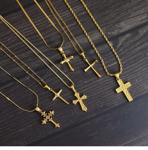 Detailed set of six diverse 18K gold-plated cross pendants on various stylish metal chains