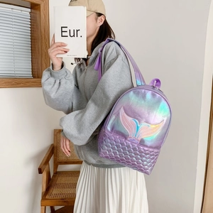 Detail of laser holographic mermaid backpack with embroidery and fish scale pattern
