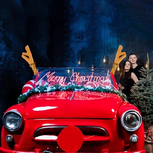 Christmas reindeer car decoration kit with plush antlers and a red nose on a red vehicle