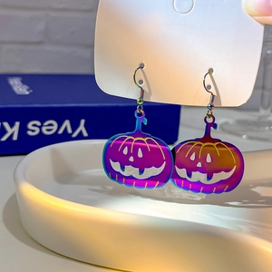 Rainbow gradient pumpkin earrings with hollow face design for Halloween jewelry style
