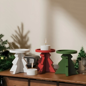 Three-piece decorative Christmas tree candle holders in white, red and green matte finish