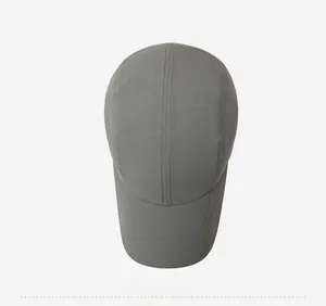 Top view of a dark grey five-panel quick-dry sports cap with minimalist stitching details