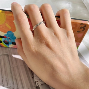 Minimalist S925 sterling silver drop ring with rose gold accents and pavé cubic zirconia