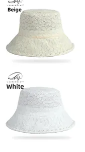 Detailed view of beige and white lace sun hats featuring floral patterns and pearl edges