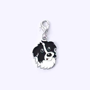 Ciondolo cane Border Collie in smalto bianco e nero con moschettone in argento per borse
