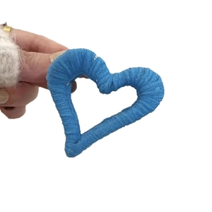 Blue heart-shaped plush hair claw clip handmade with yarn texture for women's hairstyle