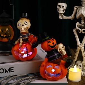 Halloween glowing resin skeleton and pumpkin figurines with colorful LED light decor