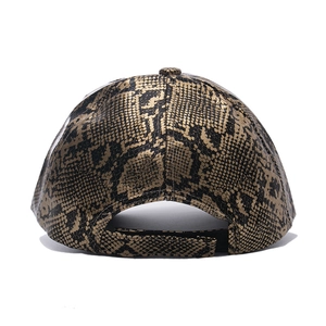 Faux leather baseball cap featuring gold and black snakeskin pattern and back strap