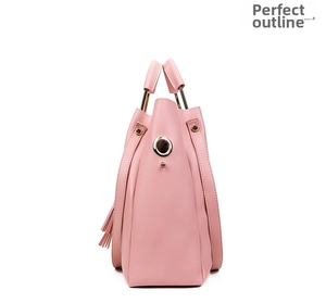 Pink handbag detail showing the side profile with tassel pendant and metal ring buckle