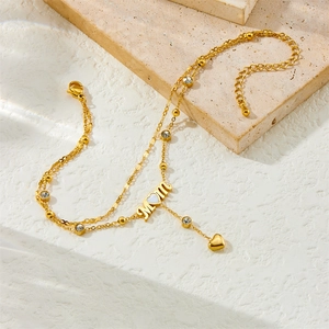 Gold double-layer MOM anklet with heart shell inlay and cubic zirconia charms