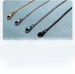 Detail of 35mm stainless steel blank bar necklaces in gold, silver, black and rainbow