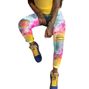 Women's multi-color tie-dye ripped jeans with slim fit and distressed knee details