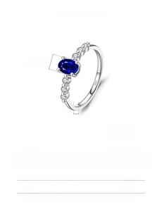Detail view of oval blue gemstone ring with S925 silver hallmarks and size specifications