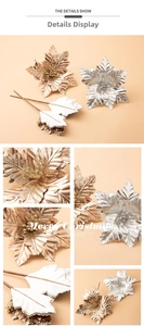 Detailed view of glittery artificial Christmas poinsettia flowers in gold, silver, and white