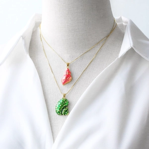 Chic 18k gold plated sea shell pendant necklaces with colorful enamel on a white shirt