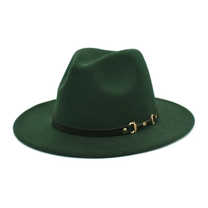 Detail of dark green wool fedora hat with black leather belt and gold metal buckle