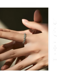 Detailed shot of s925 silver mint green floral ring with sparkling zircon stones