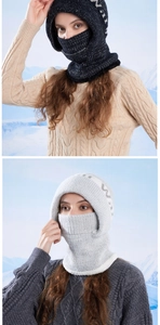 Close-up of thick knitted winter hat with integrated neck warmer and soft fleece lining