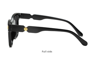Detail view of black frame sunglasses showing wavy temples and gold circular hinge accents