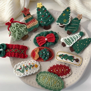 Handmade knitted Christmas hair clip set with festive trees and red bows for women