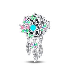 Detailed dreamcatcher charm with colorful enamel butterflies and turquoise stone center