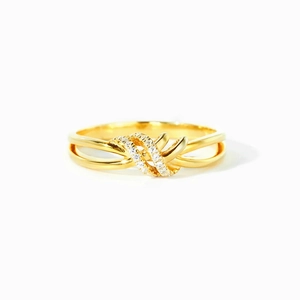 Bague élégante en argent 925 avec nœud et oxydes de zirconium brillants en finition dorée