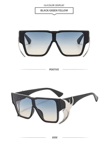 Close-up of black oversized square sunglasses with blue-yellow gradient lenses and wing decor