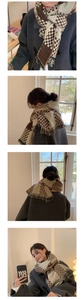 Detail view of brown and beige checkered cashmere-feel scarf with elegant fringes