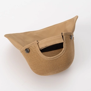 Women's khaki straw sun hat with adjustable velcro strap and breathable patchwork design