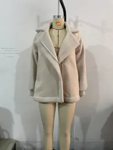 Detail of beige faux shearling biker jacket with plush white lapels and zipper closure
