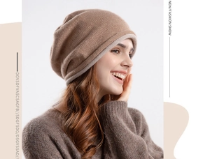 Detail of caramel brown knit beanie with soft cashmere texture and thick double-cuff design