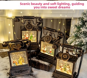 Vintage bronze telephone Christmas lanterns with LED glowing snow scene and Santa Claus motifs