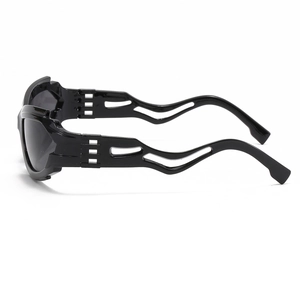 Futuristic black sunglasses featuring unique wavy temple design and sleek plastic frame