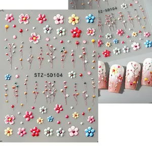 Detail showing 5D embossed colorful flower nail stickers with raised 3D texture and buds