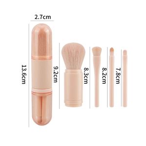 Portable 5-in-1 travel makeup brush set in pink capsule case with fiber bristles
