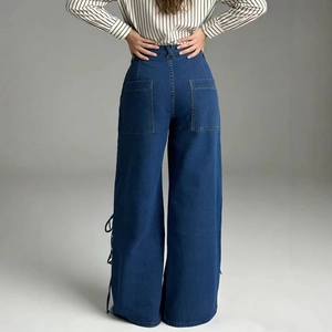 Jeans donna a vita alta gamba larga blu scuro con lacci laterali e tasche posteriori